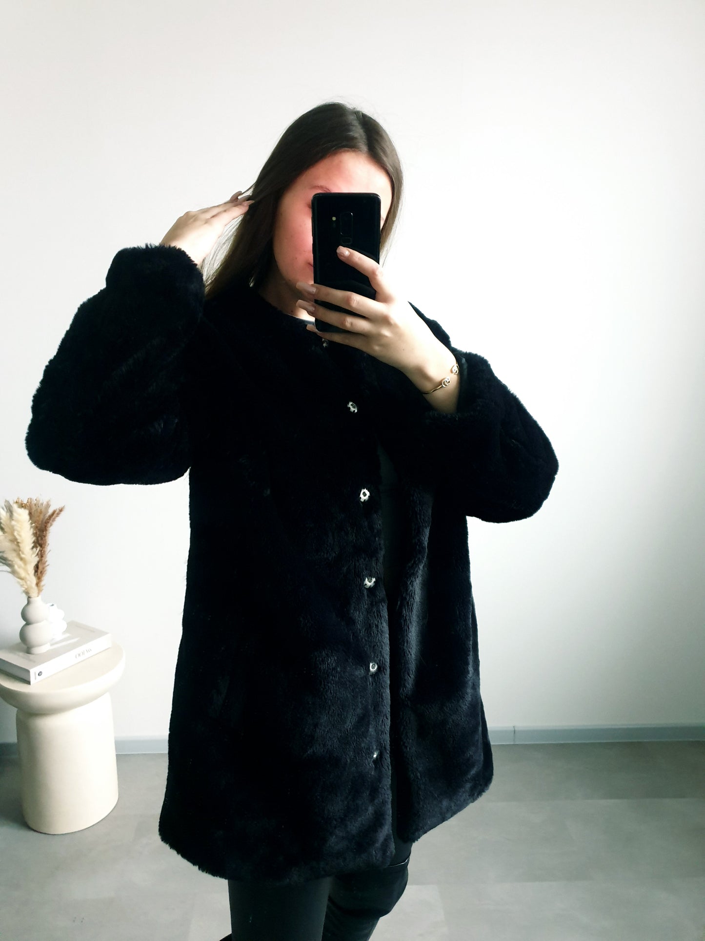 Čierny kožúšok 40