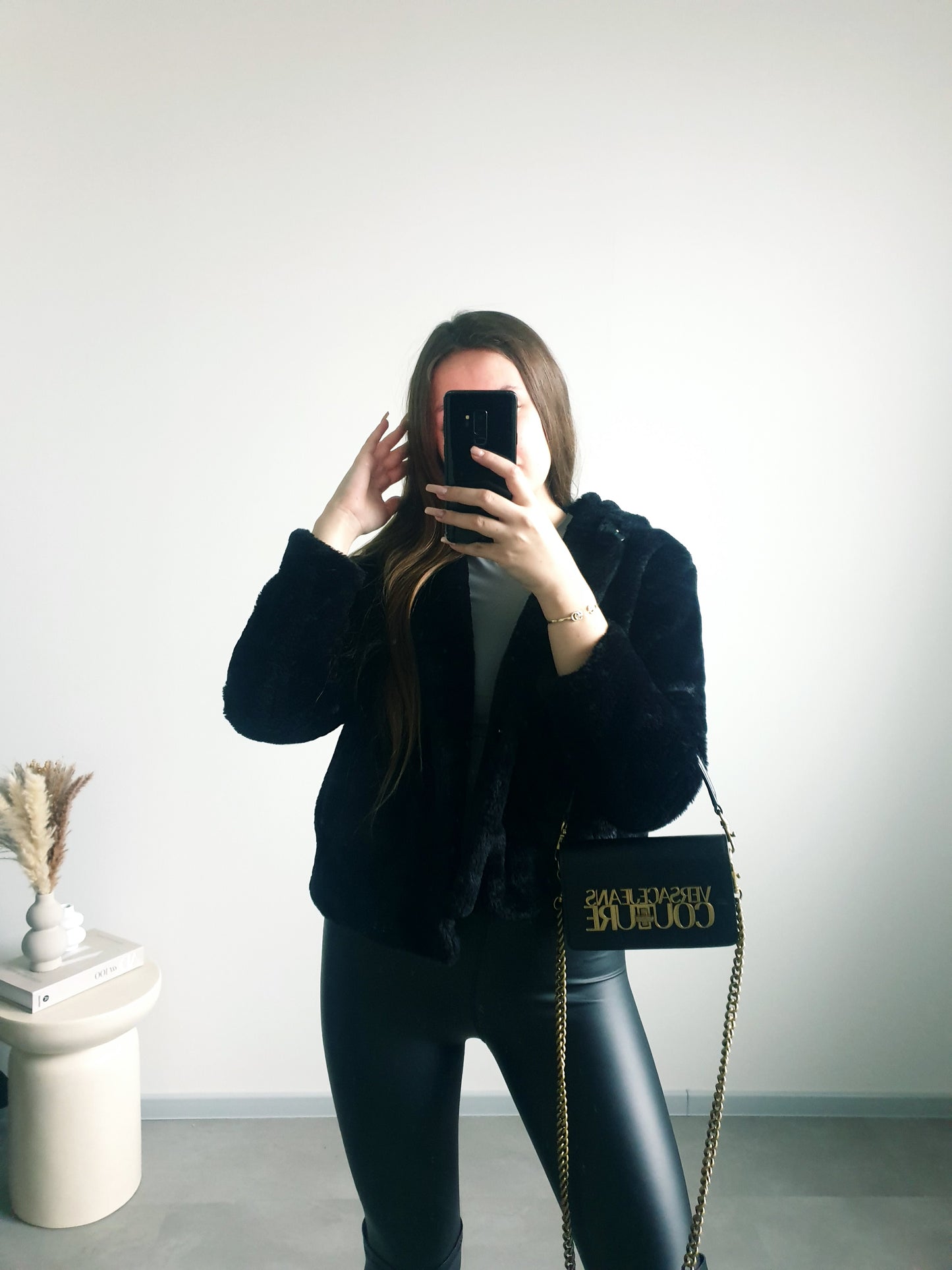 Čierny kožúšok XS