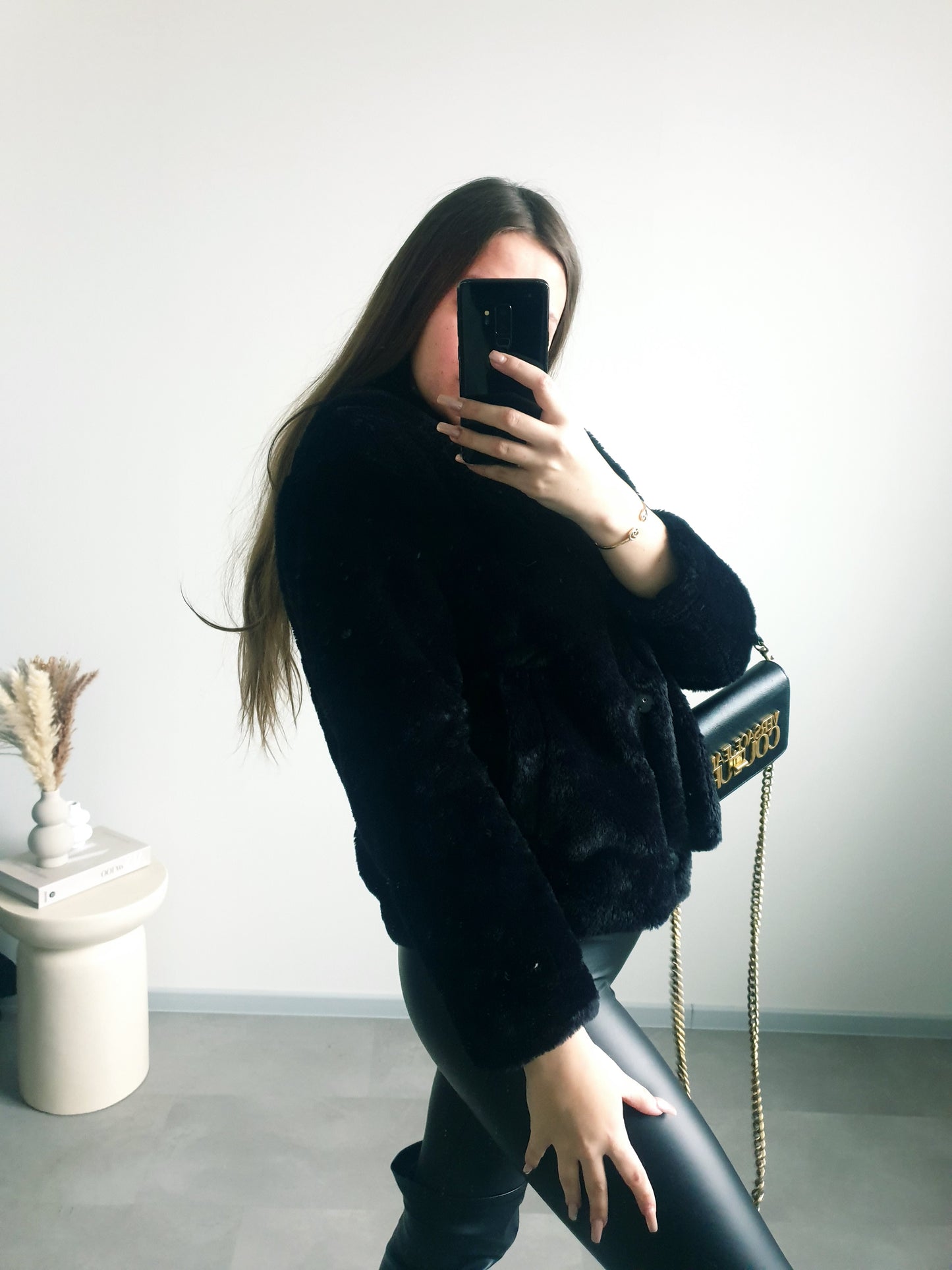 Čierny kožúšok XS