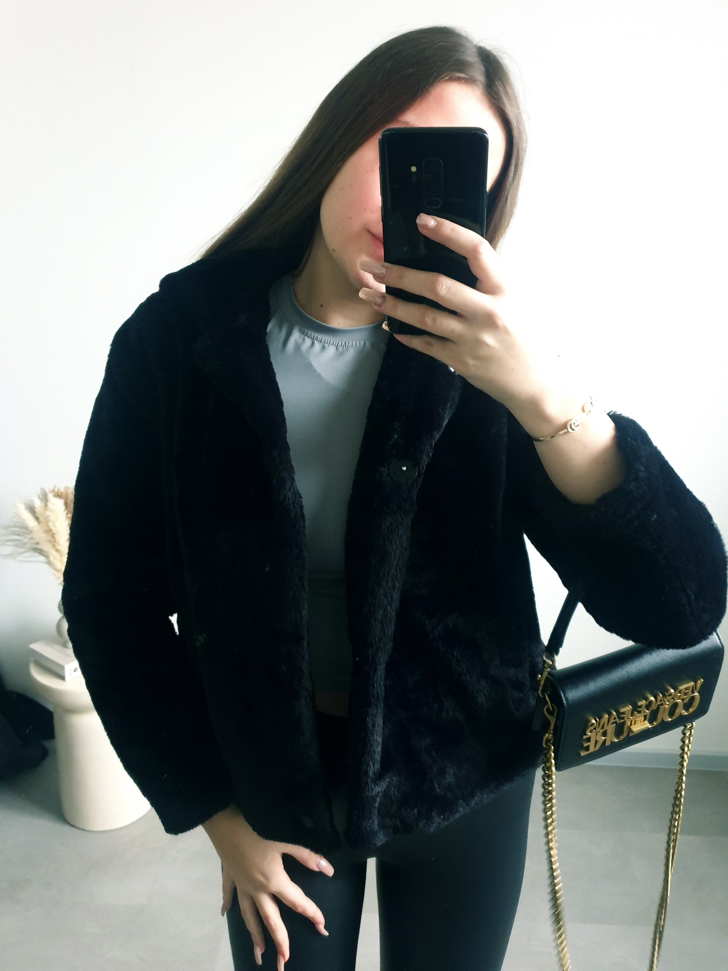 Čierny kožúšok XS